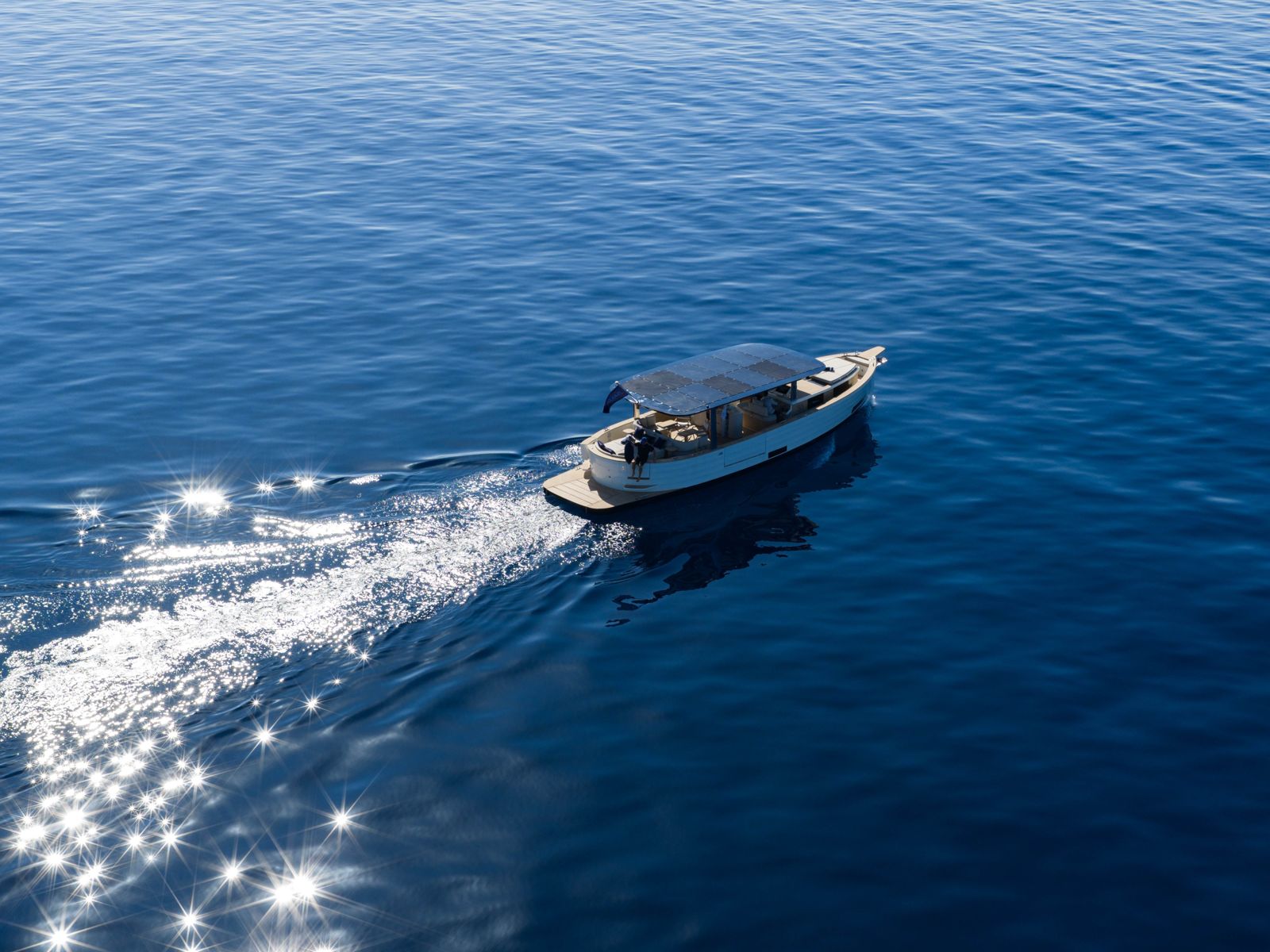 The SAMAR 50 under way on deep blue water, seen from above