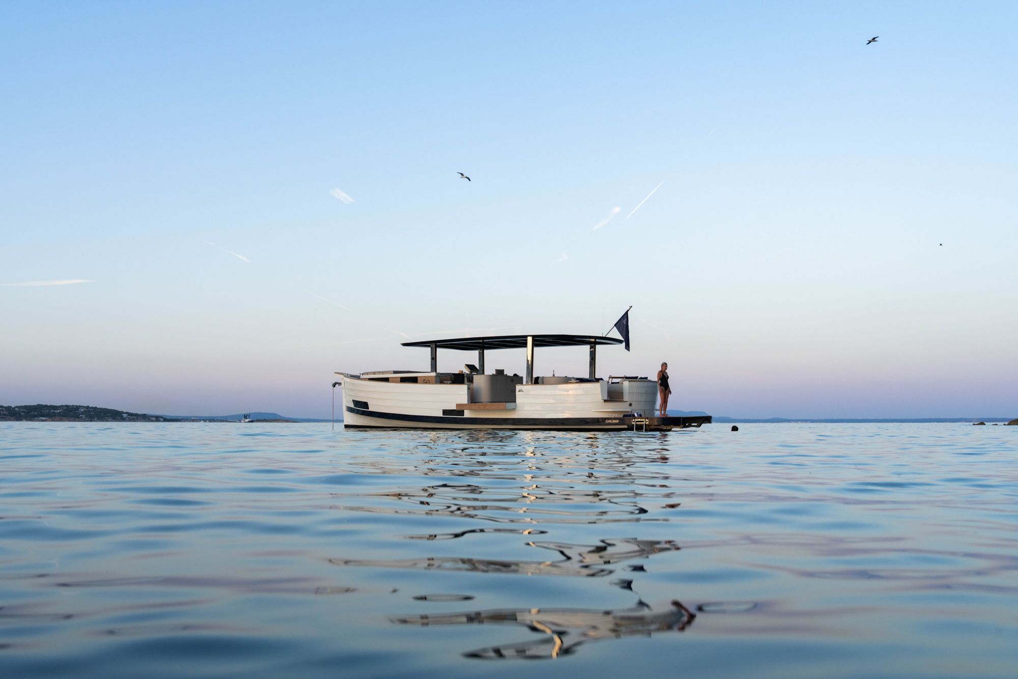 The SAMAR 50 alone on calm water at dusk